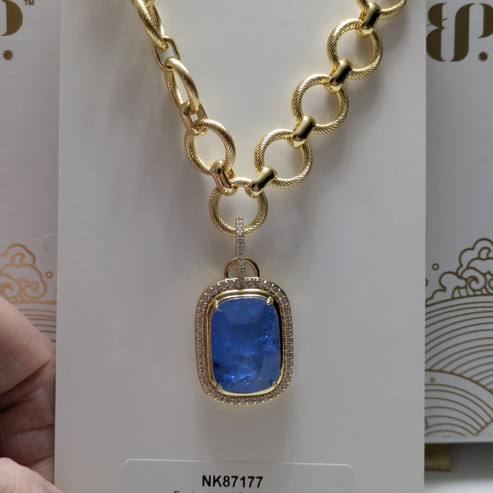 Elegant Gold Necklace with Blue Pendant